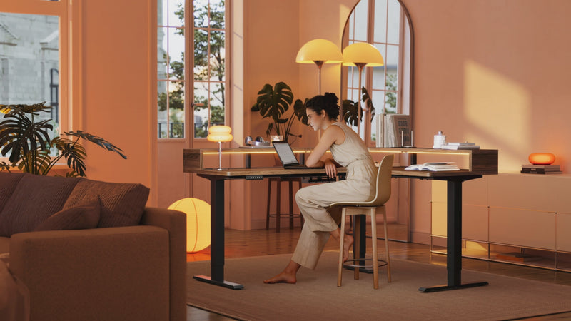 HUANUO height adjustable standing desk collection in a modern home office